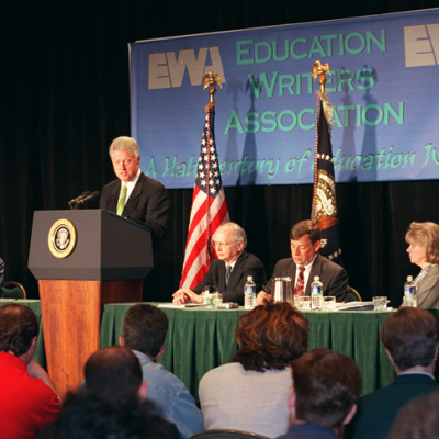 President Bill Clinton gives the keynote address at EWA's 2000 National Seminar in Atlanta. From left, EWA 1999-2000 Board Officers - Vice President Robin Farmer of the Richmond Times Dispatch, President Kit Lively of the Chronicle of Higher Education, Clinton, U.S. Secretary of Education Richard Riley, Immediate Past President Bill Graves of the Oregonian, Secretary Joan Richardson of the Detroit Free Press and Board member Steve Henderson of the Baltimore Sun.