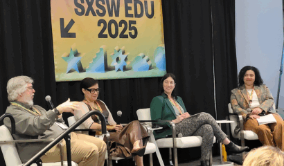 A speaker panel featuring three women and one man.