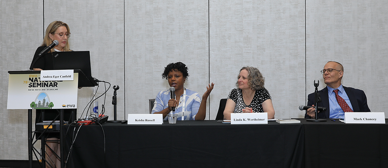 A panel with three women and one man. 