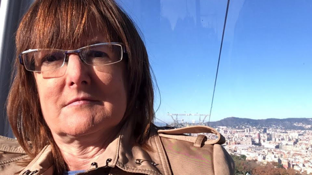 Lori in a funicular on her previous travels.